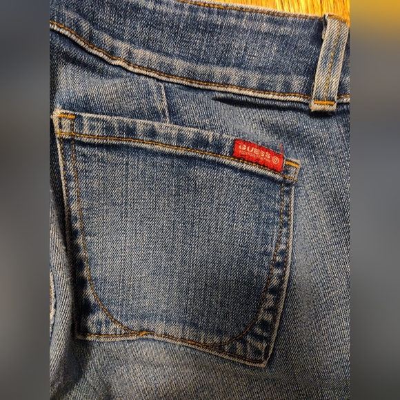 GUESS stretch denim, low rise, boot cut jeans in light, slightly distressed wash - Picture 4 of 5